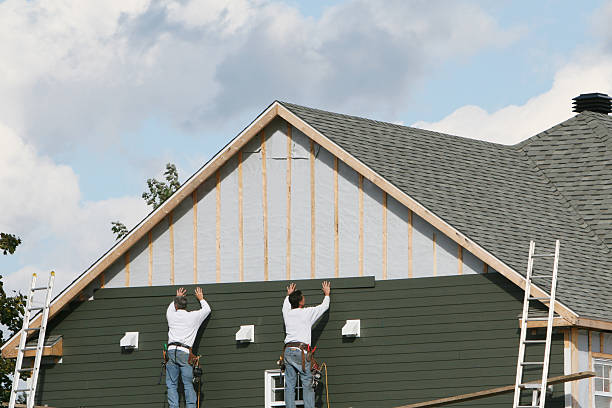 Professional Storm Damage Siding Repair technician working in Lansdale, PA
